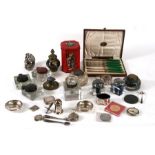 A silver vesta; together with a silver stamp box; a silver & enamelled Capstan inkwell; a pair of