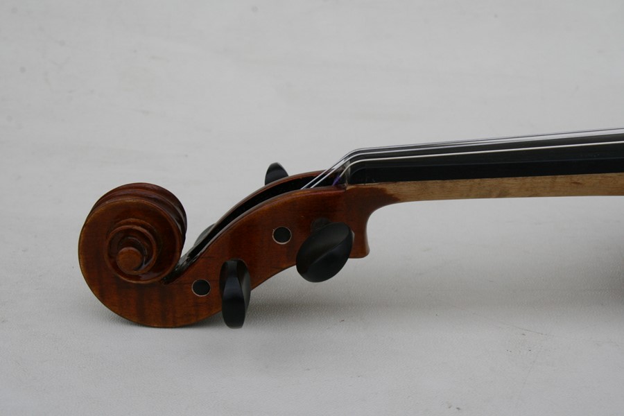 A one piece back violin and bow, cased.Condition Report Violin back measures 35cms. - Image 15 of 23