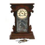 A Victorian Ansonia 'Gingerbread' mantle clock.
