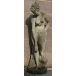 A well weathered stoneware garden statue of a classical figure, 108cms (42.5ins) high.