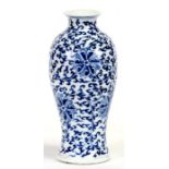 A 19th century Chinese blue & white vase decorated with flowers and foliate scrolls, four
