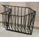 A cast iron manger, 67cms (26.25ins) wide.