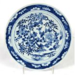 A blue & white charger decorated with birds amongst foliage, 30cms (12ins) diameter.Condition Report