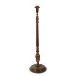 A turned mahogany three quarter height standard lamp, 122cms (48ins) high.