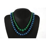 A graduated green glass bead necklace; together with a blue hardstone bead necklace (2).