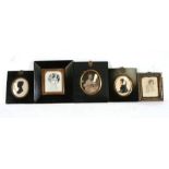 A group of ebonised portrait miniature frames; and other frames.