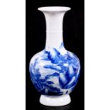 A Chinese blue & white vase decorated with figures in a mountainous landscape, 21cms (8.25ins)