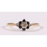 A 9ct gold sapphire & diamond cluster ring, approx UK size 'P'.