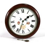 A mahogany cased wall clock, the white dial with Roman numerals, 38cms (15ins) diameter.