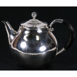 A Georg Jensen Cosmos pattern silver teapot, circa 1929, 15cms (6ins) high.