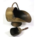A brass coal scuttle & shovel.