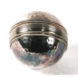 A novelty silver plated desk weight in the form of a cricket ball, 7cms (2.25ins) diameter.