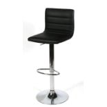 A modern design adjustable swivel bar or breakfast stool.