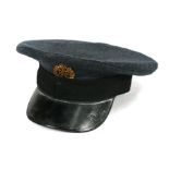 A Royal Air Force officers cap made by L Silberston & Sons Ltd. London with brass cap badge