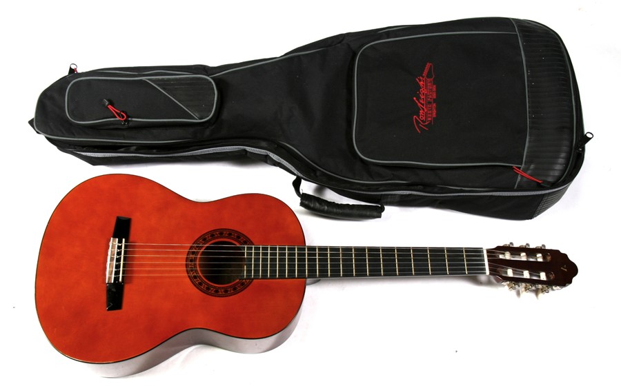 A Valencia six-string acoustic guitar, serial No. 6907176, in a soft carry bag.