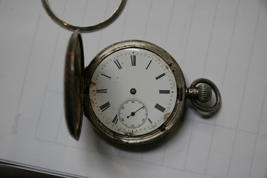 A silver open faced pocket watch, the white enamel dial with Roman numerals and subsidiary seconds - Image 5 of 6