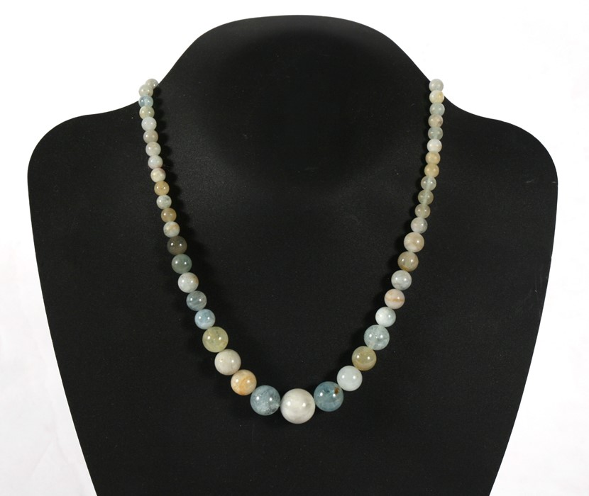 A jade or hardstone graduated bead necklace.