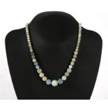 A jade or hardstone graduated bead necklace.