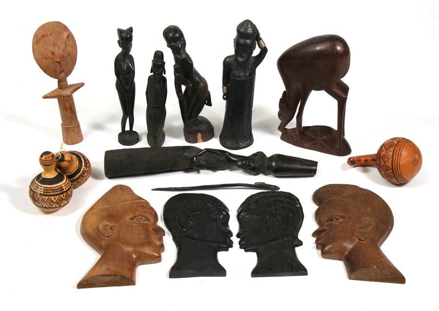 Tribal / African Art. A quantity of carved hardwood figures and gourds.