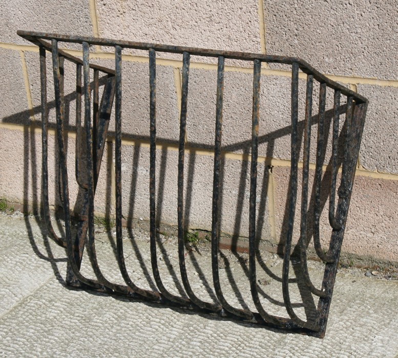 A cast iron manger, 67cms (26.25ins) wide.