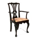 A Georgian style mahogany carver chair with pierced splat and drop-in seat, on cabriole front