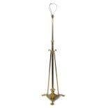 An early 20th century brass standard lamp.