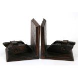A matching pair of wooden WW1 tanks mounted as bookends. The tanks are 12.5cms (5ins) long