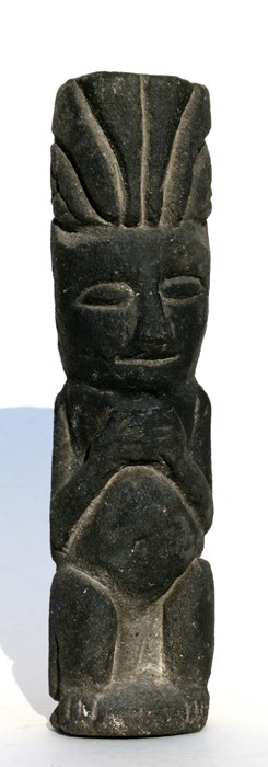 A South American volcanic stone figure, 23cms (9ins) high.