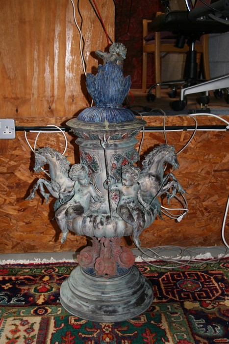 A bronzed centre piece decorated with hippocampus and cherubs, surmounted with a further cherub - Image 5 of 6