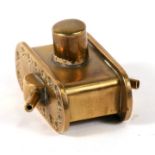 A small brass WW1 trench art tank with a petrol lighter concealed inside the top turret. 6.5cms (2.