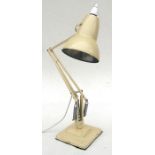 A 1930's Herbert Terry anglepoise desk lamp on square stepped base in original cream paint.