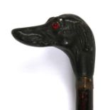 A Edwardian umbrella with dog head handle. 70cm (27.5 ins) long