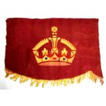 An early 20th century embroidered and printed Kings Crown on a red felt backing with tassels at