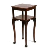 A walnut two tier occasional table on shell capped cabriole legs. 35cm (13.75 ins)