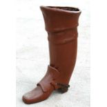 A shop display in the form of an oversized leather boot, 112cms (44ins) high.