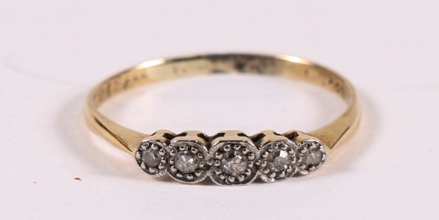 A 18ct gold five-stone dress ring, approx UK size 'M'.