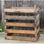 Five wooden apple crates.