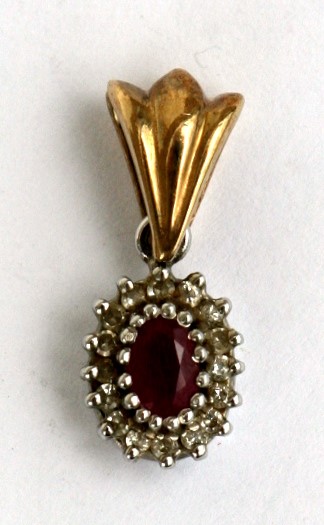 A 9ct gold ruby and diamond pendant