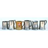 Six military tankards, four are engraved to J.E. Mills of the Royal Air Force, one to Operation