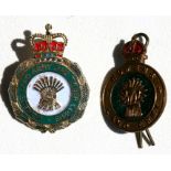 A WW2 Women's Land Army brass and enamel badge together with a cased Women's Land Army and Timber