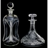 An early 20th century clear glass decanter with waisted body; together with a cut glass ship's