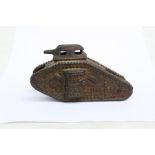 A WW1 cast metal U.S.A. Tank Bank 1918 money box. Length 11.5cms (4.5ins)