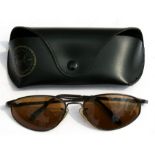 A pair of vintage Ray-Ban Activelifestyle sunglasses, serial number 'RB3131', cased.