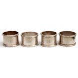 Four 1950s Military marked silver plated napkin rings