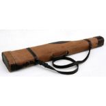 A canvas and leather leg of mutton single gun case. 75cm (29.5 ins) long