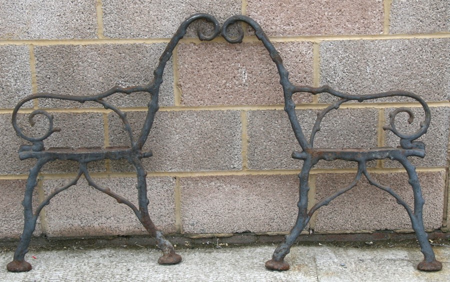 A pair of Victorian cast iron bench ends