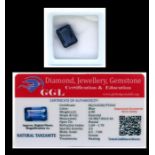 A natural tanzanite loose gemstone with GGL certificate report stating the tanzanite to be 6.9cts,
