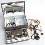 A quantity of costume jewellery in a leather jewellery box