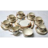 A Wedgwood Art Deco part tea set decorated with flowers.