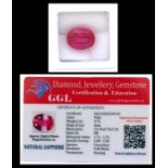 A natural sapphire loose gemstone with GGL certificate report stating the sapphire to be 9.75cts,